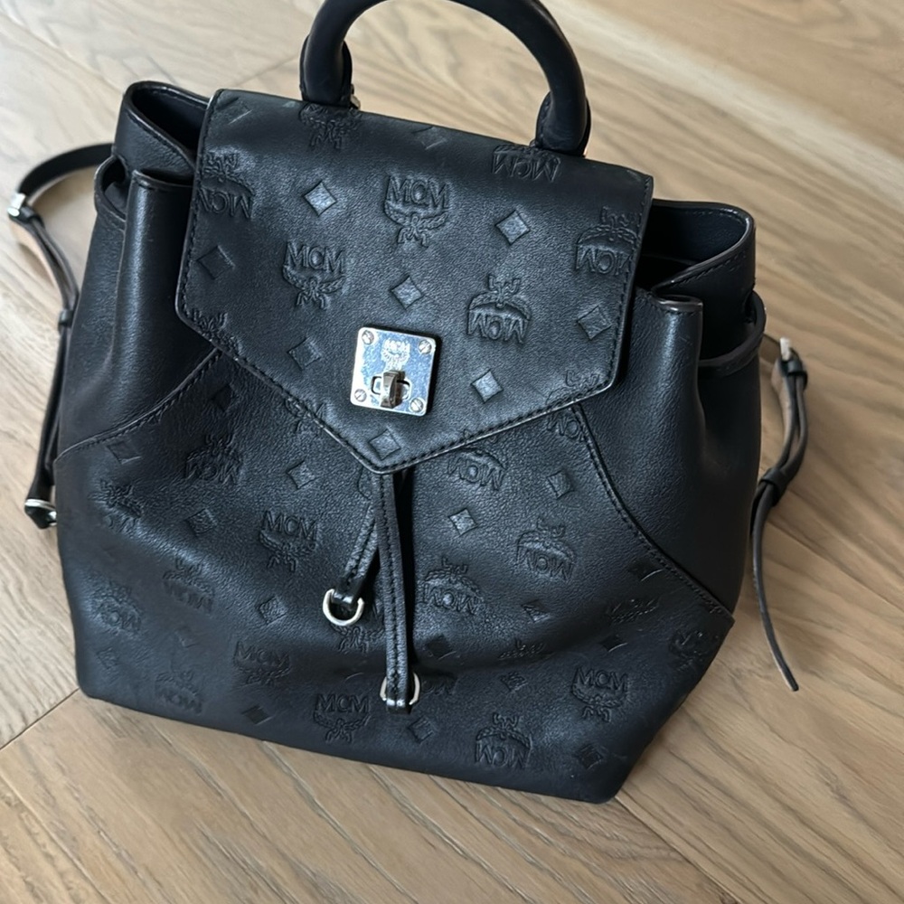 Mcm ladies black leather backpack